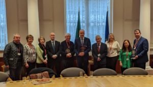 Michael Leonards Family Ciarán MacAirt and Councillor Naughton with An Tánaiste Micheál Martin